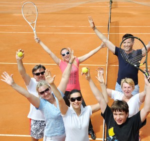 Happy family on the court